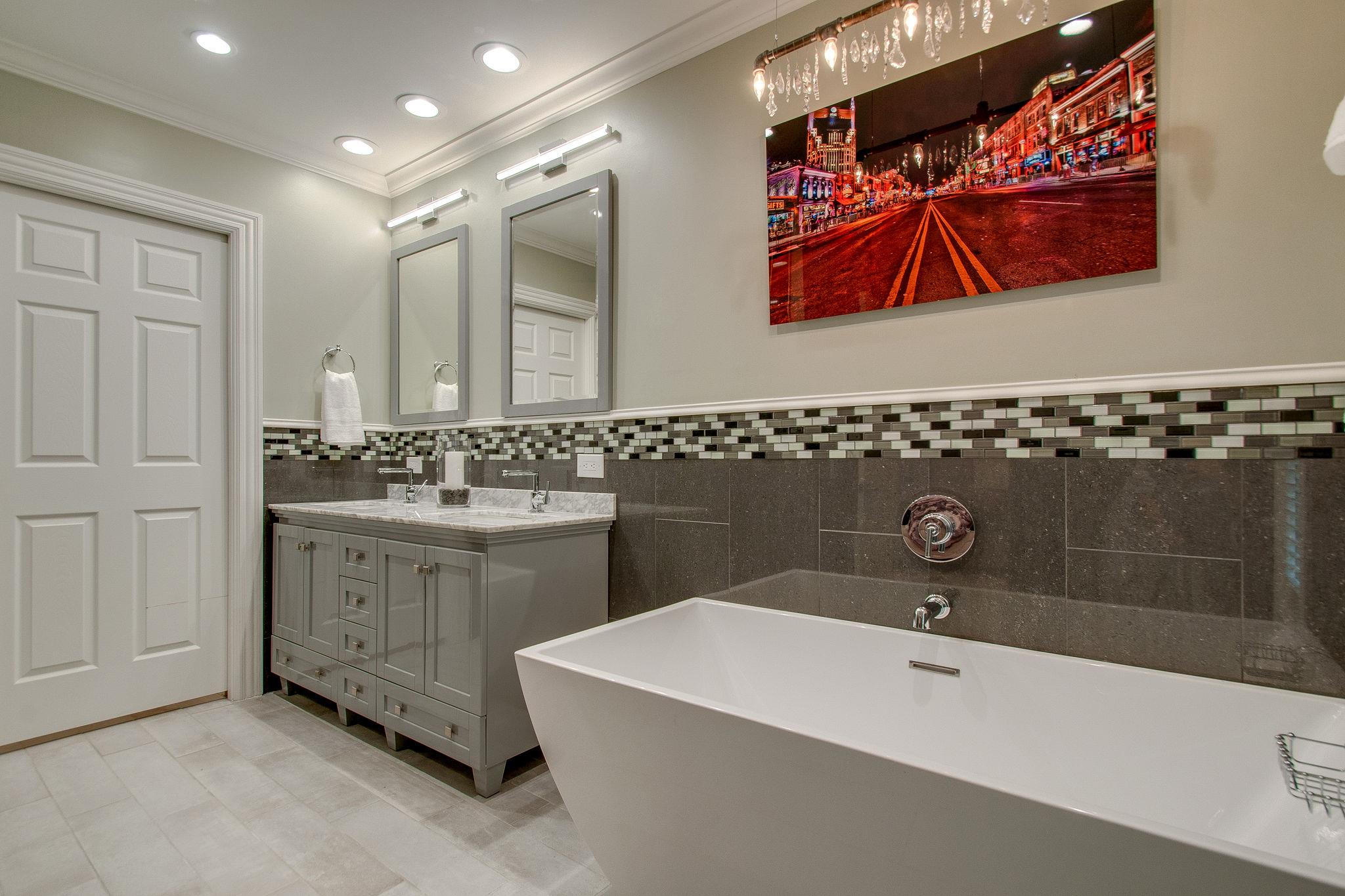 731 General George Patton Road Nashville, TN 37221 - Photo 15 of 19 a bathroom with a sink a tub and shower