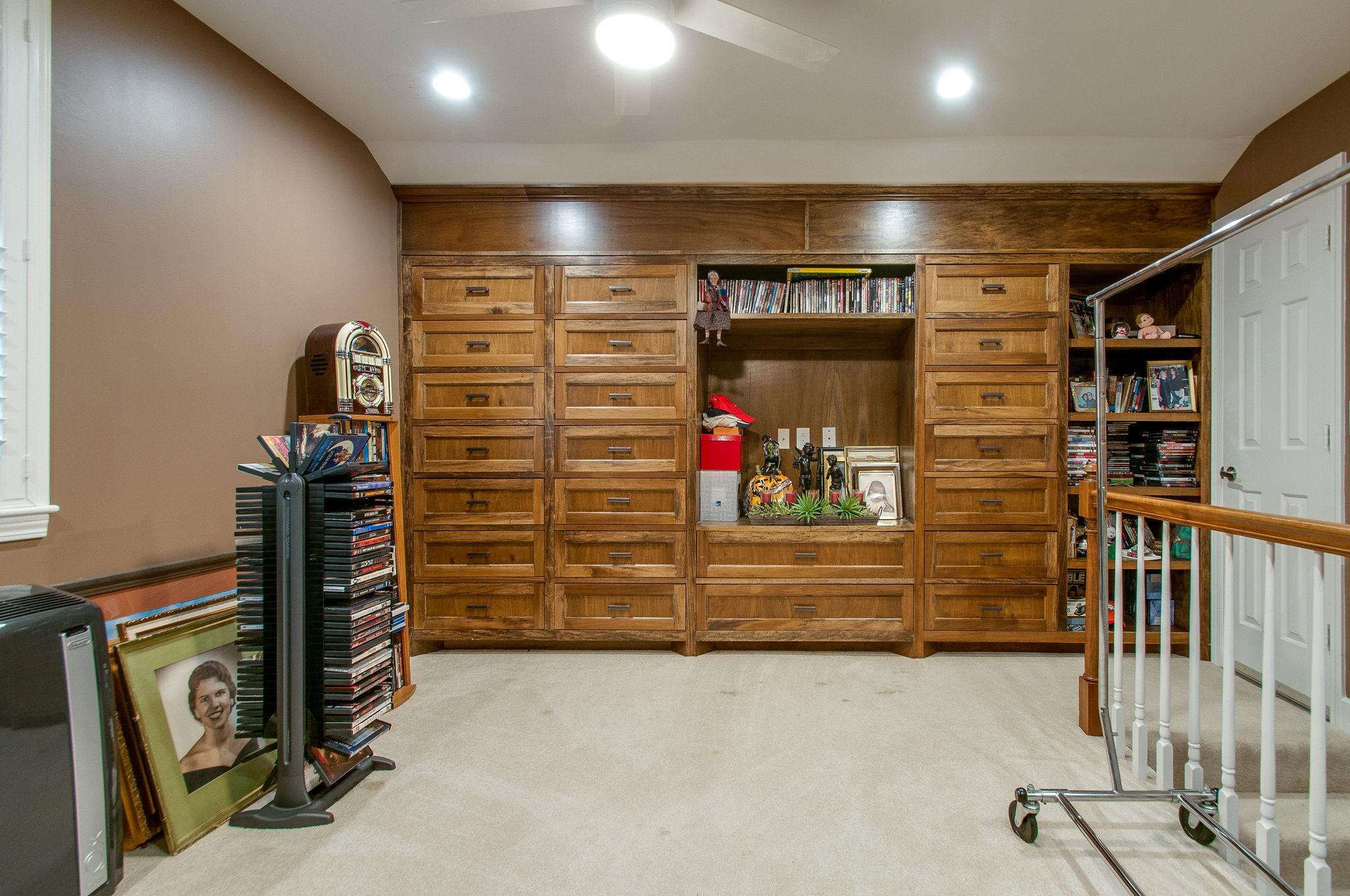731 General George Patton Road Nashville, TN 37221 - Photo 18 of 19 a view of water heater room with shelves