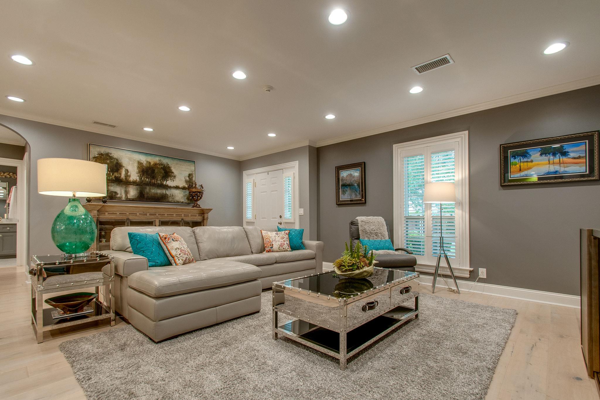 731 General George Patton Road Nashville, TN 37221 - Photo 4 of 19 a living room with furniture and a flat screen tv
