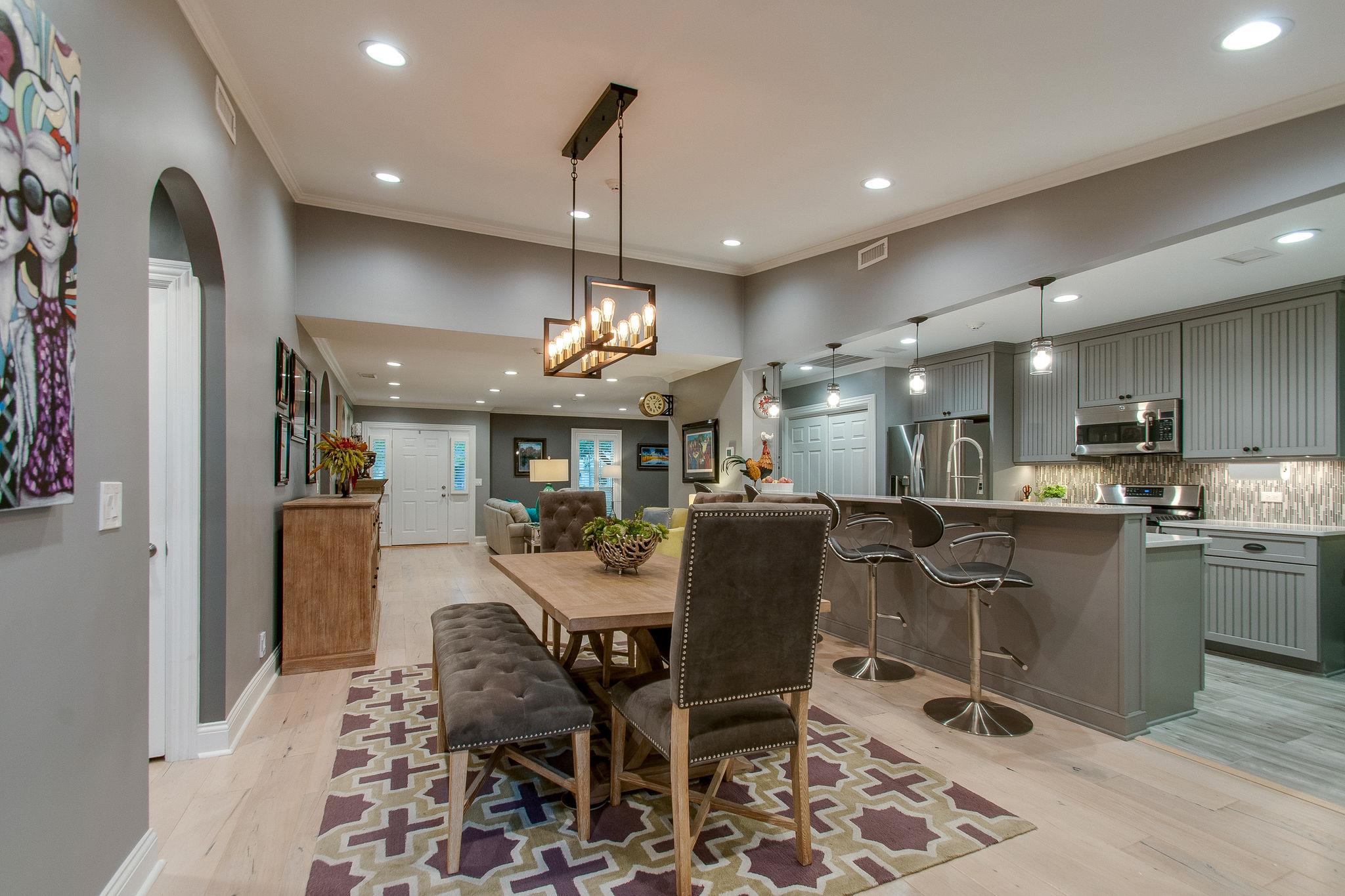 731 General George Patton Road Nashville, TN 37221 - Photo 8 of 19 a large kitchen with a table and chairs