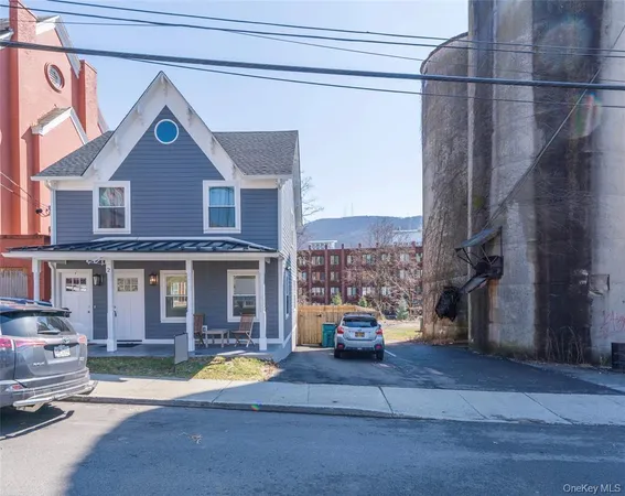 a view of multiple houses with a yard