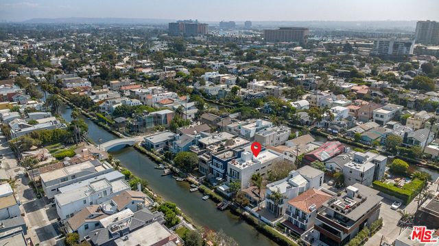 an aerial view of a city with lots of residential buildings