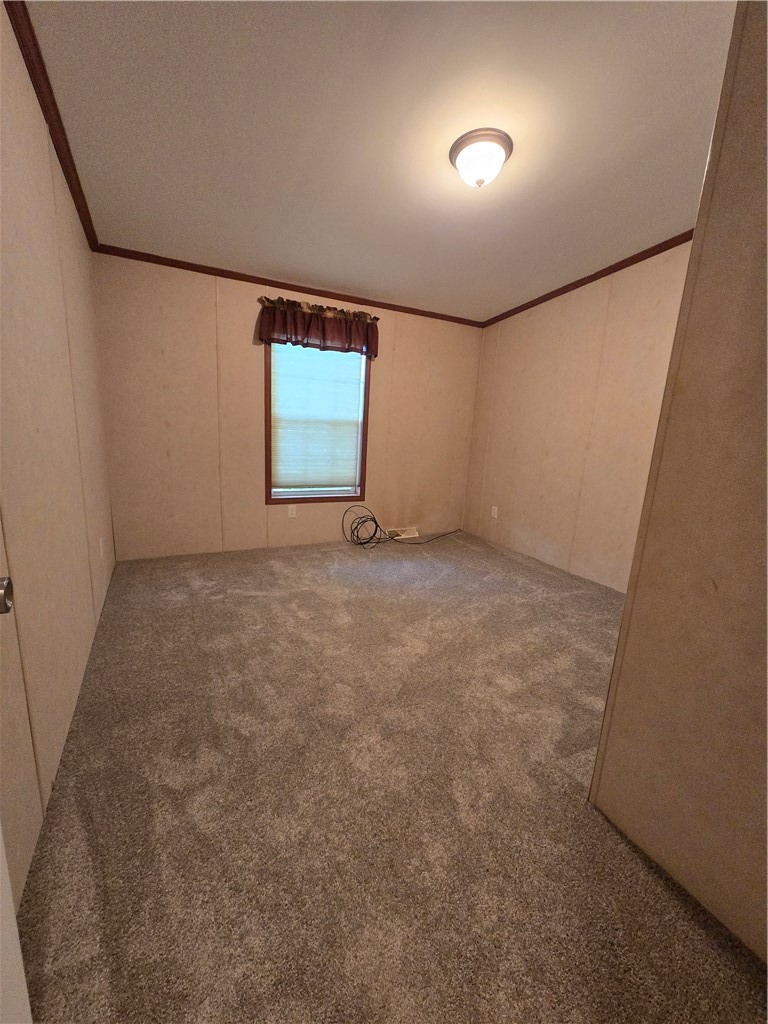 5337 State Rte 26 Triangle, NY 13862 - Photo 15 of 22 Vaulted ceilings and plush carpeting define this comfortable bedroom space.