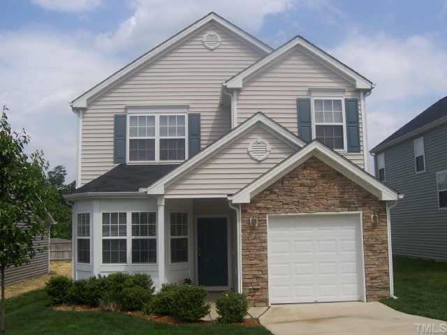 4844 Tommans Trail Raleigh, NC 27616 - Photo 1 of 1 a view of a white house next to a yard