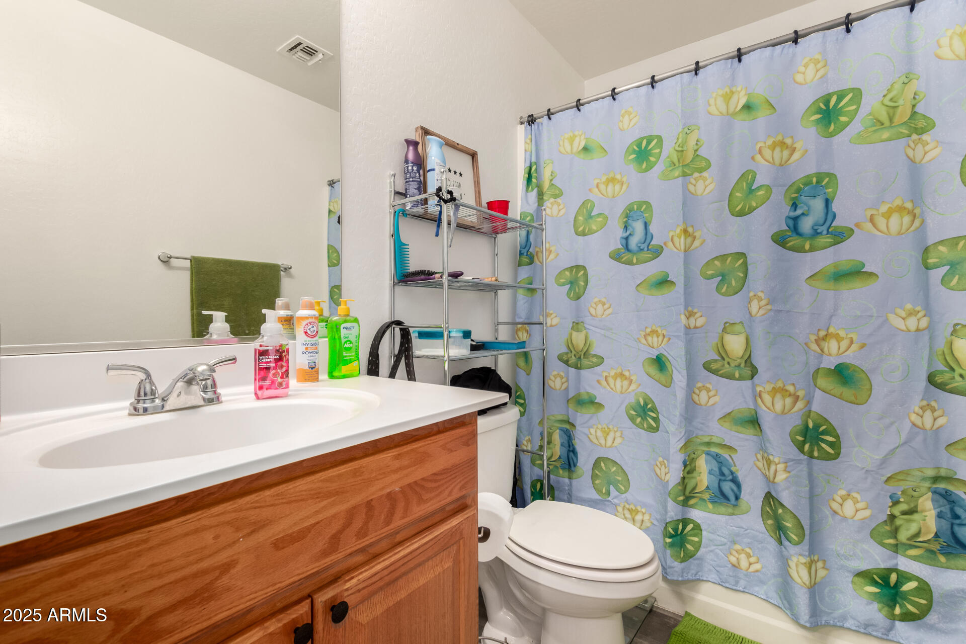 910 Prior Avenue Coolidge, AZ 85128 - Photo 15 of 22 a bathroom with a sink and a toilet