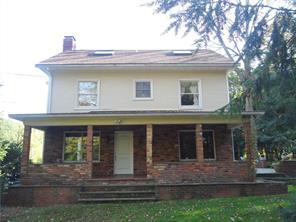 2 Guinea Road Brewster, NY 10509 - Photo 1 of 1 a view of a house with a yard and plants