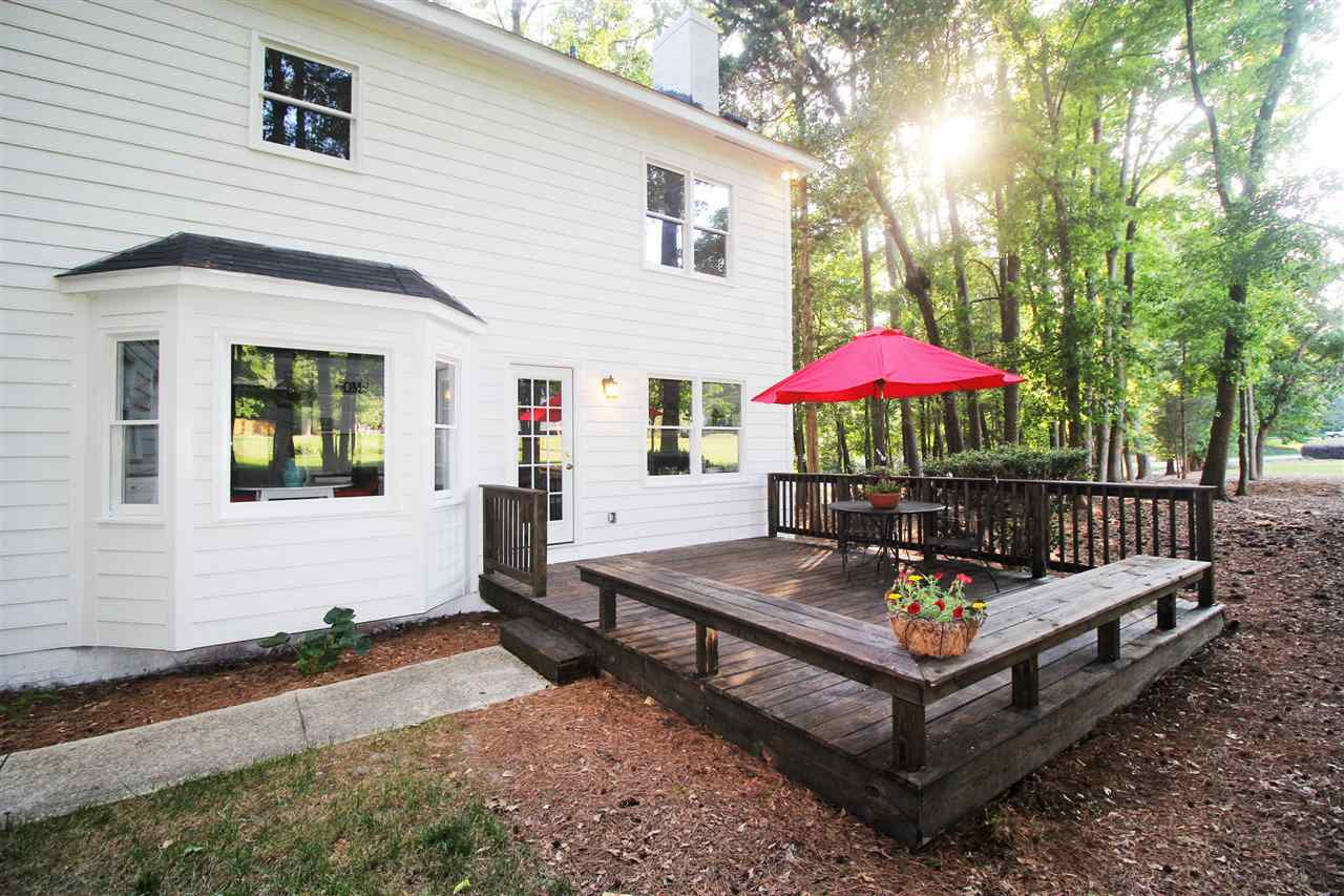 4908 Fielding Drive Raleigh, NC 27606 - Photo 23 of 25 There is a big deck off the family room. It is the perfect spot for entertaining! It is surrounded by built-in benches. Deck