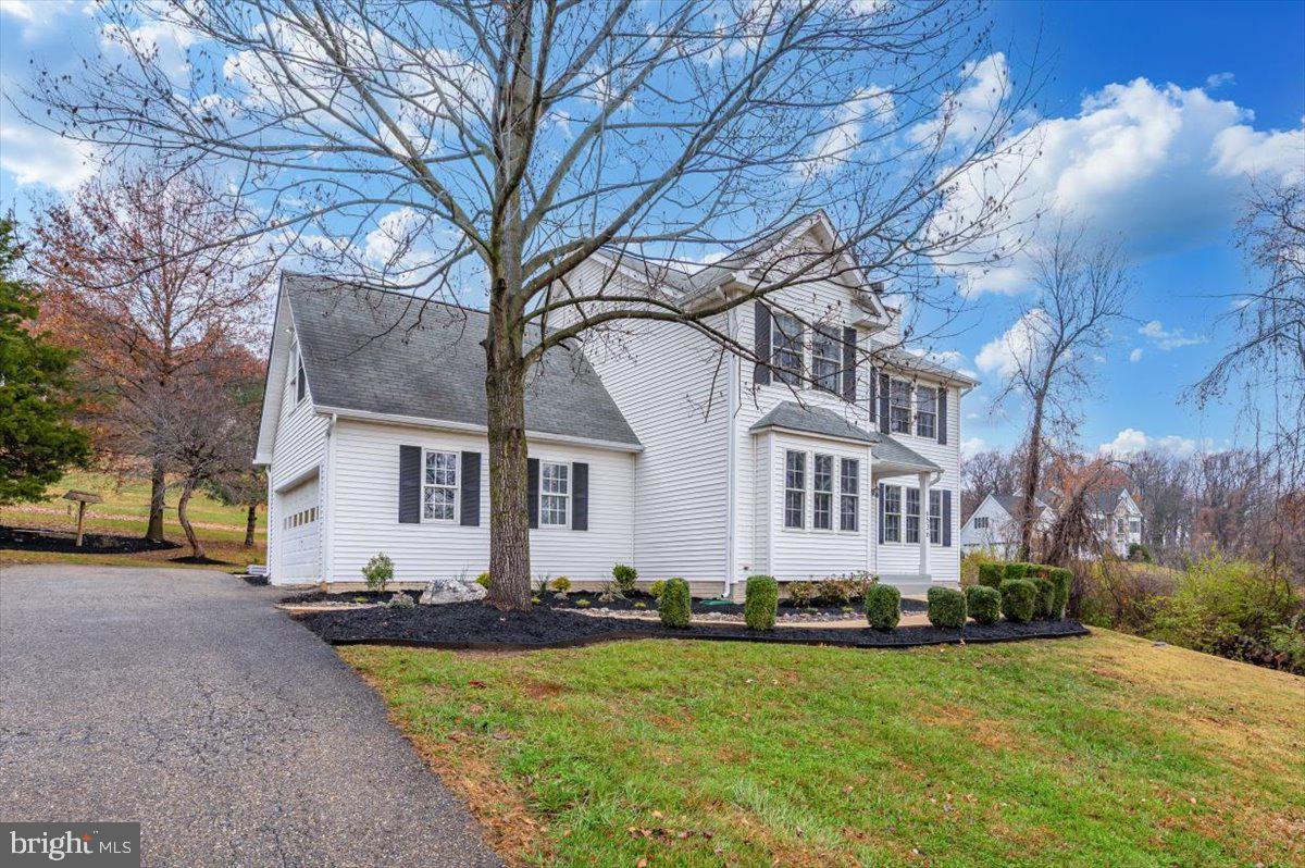 6536 South Clifton Road Frederick, MD 21703 - Photo 65 of 71 a front view of house with yard and green space