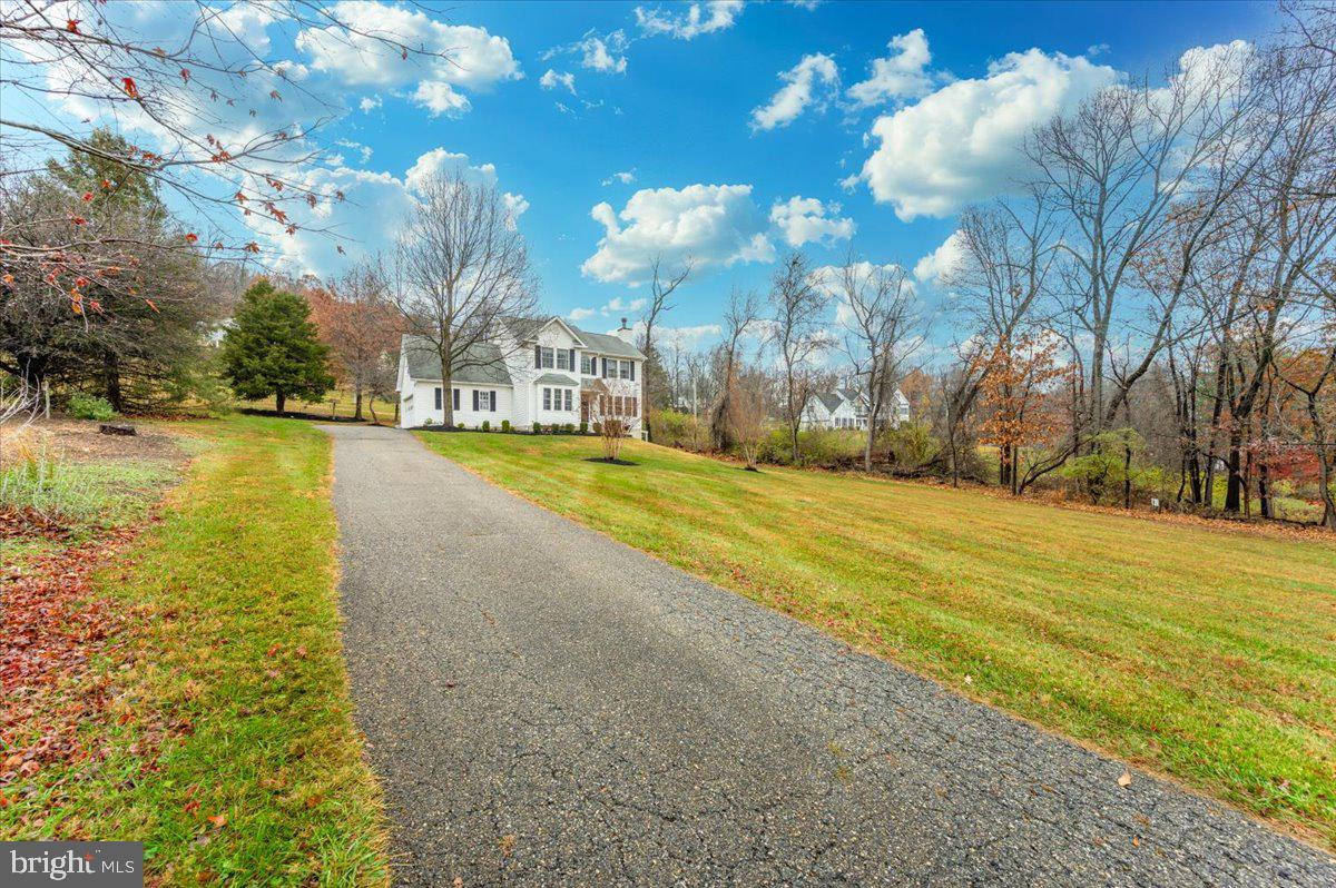 6536 South Clifton Road Frederick, MD 21703 - Photo 69 of 71 a view of a yard with swimming pool