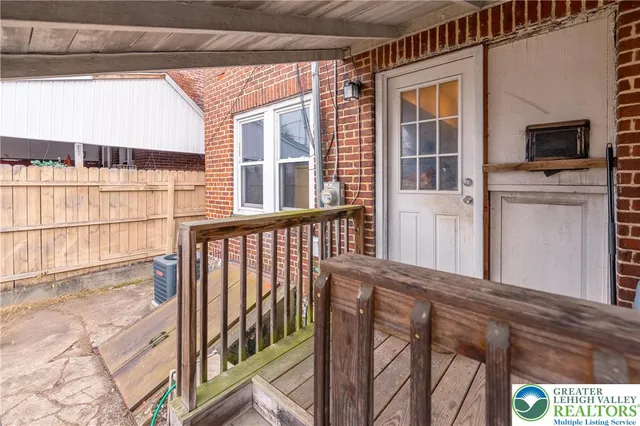 a view of a balcony and a window