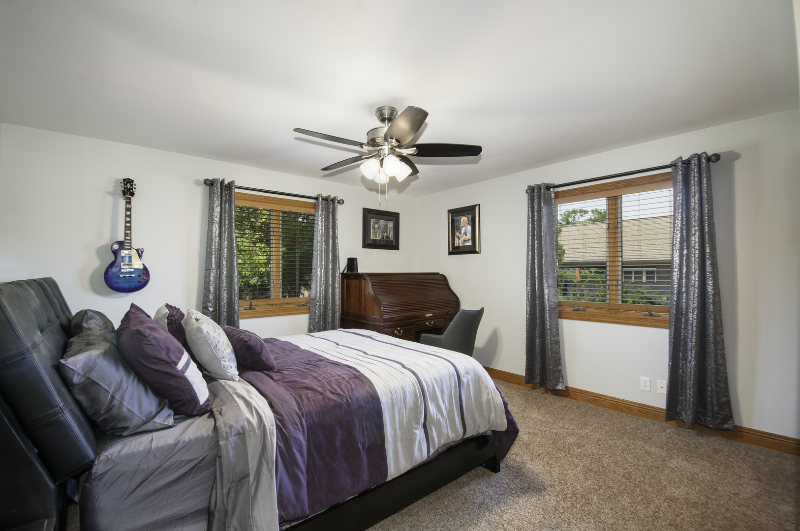 24738 South Walnut Street Elwood, IL 60421 - Photo 18 of 20 a bedroom with a large bed and a window