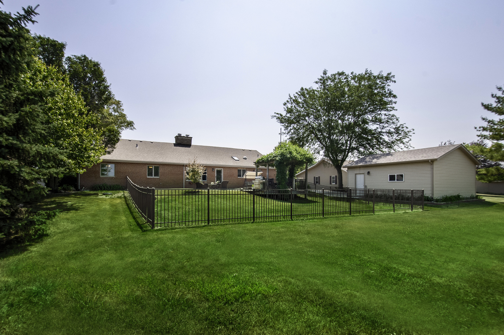 24738 South Walnut Street Elwood, IL 60421 - Photo 5 of 20 a view of a house with a big yard and a large tree