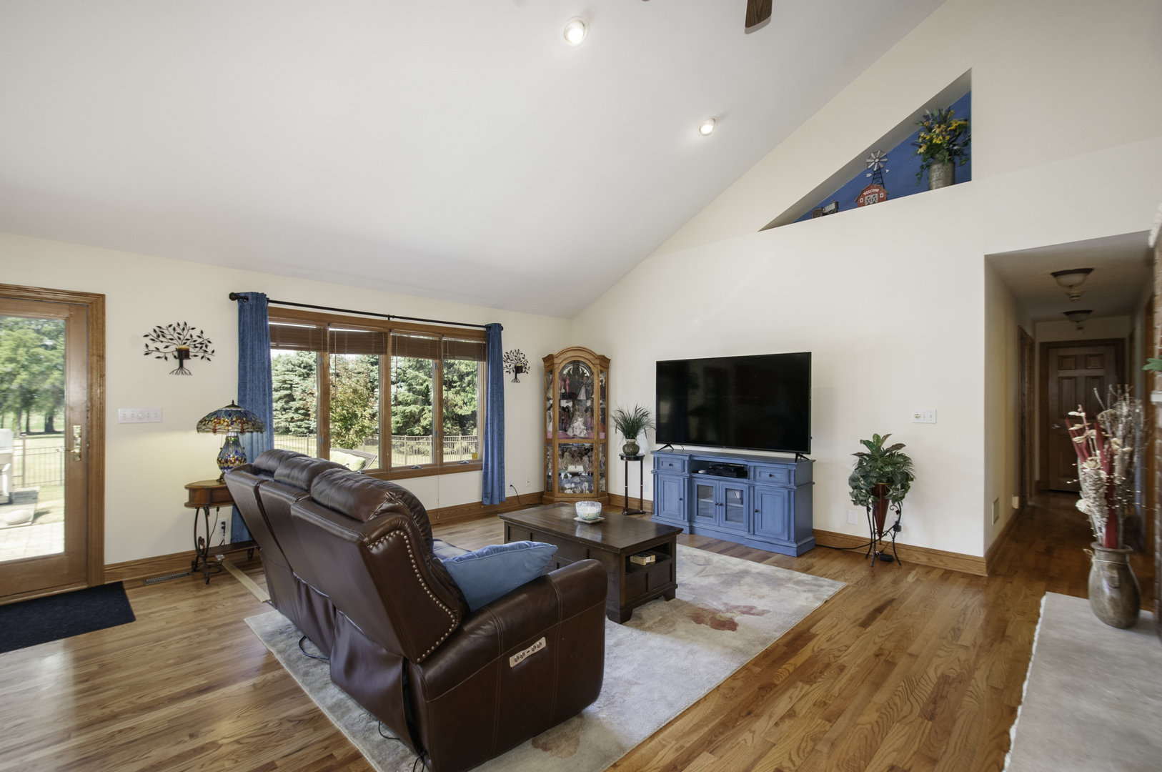 24738 South Walnut Street Elwood, IL 60421 - Photo 8 of 20 a living room with furniture and a flat screen tv