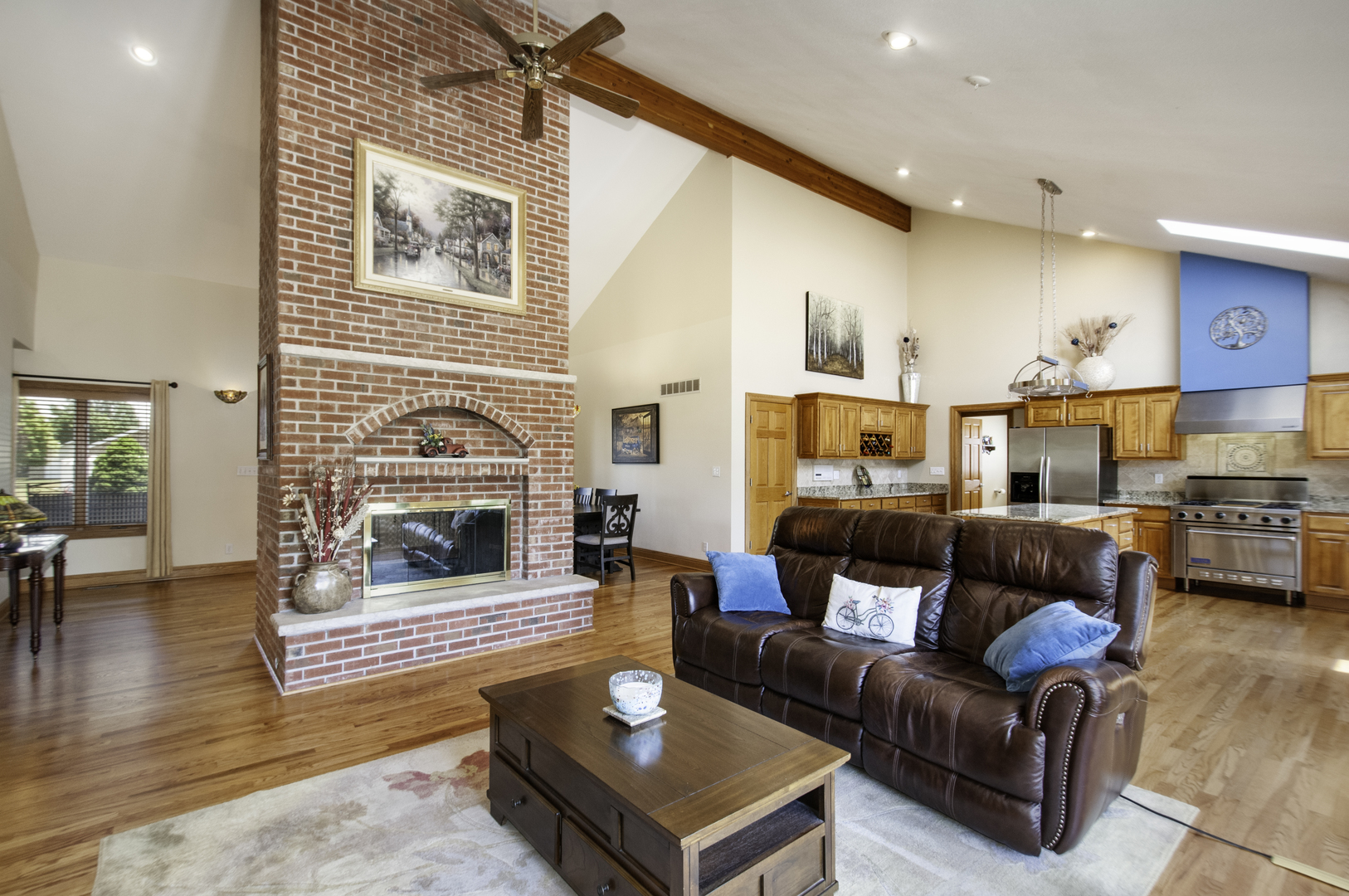 24738 South Walnut Street Elwood, IL 60421 - Photo 9 of 20 a living room with furniture and a fireplace