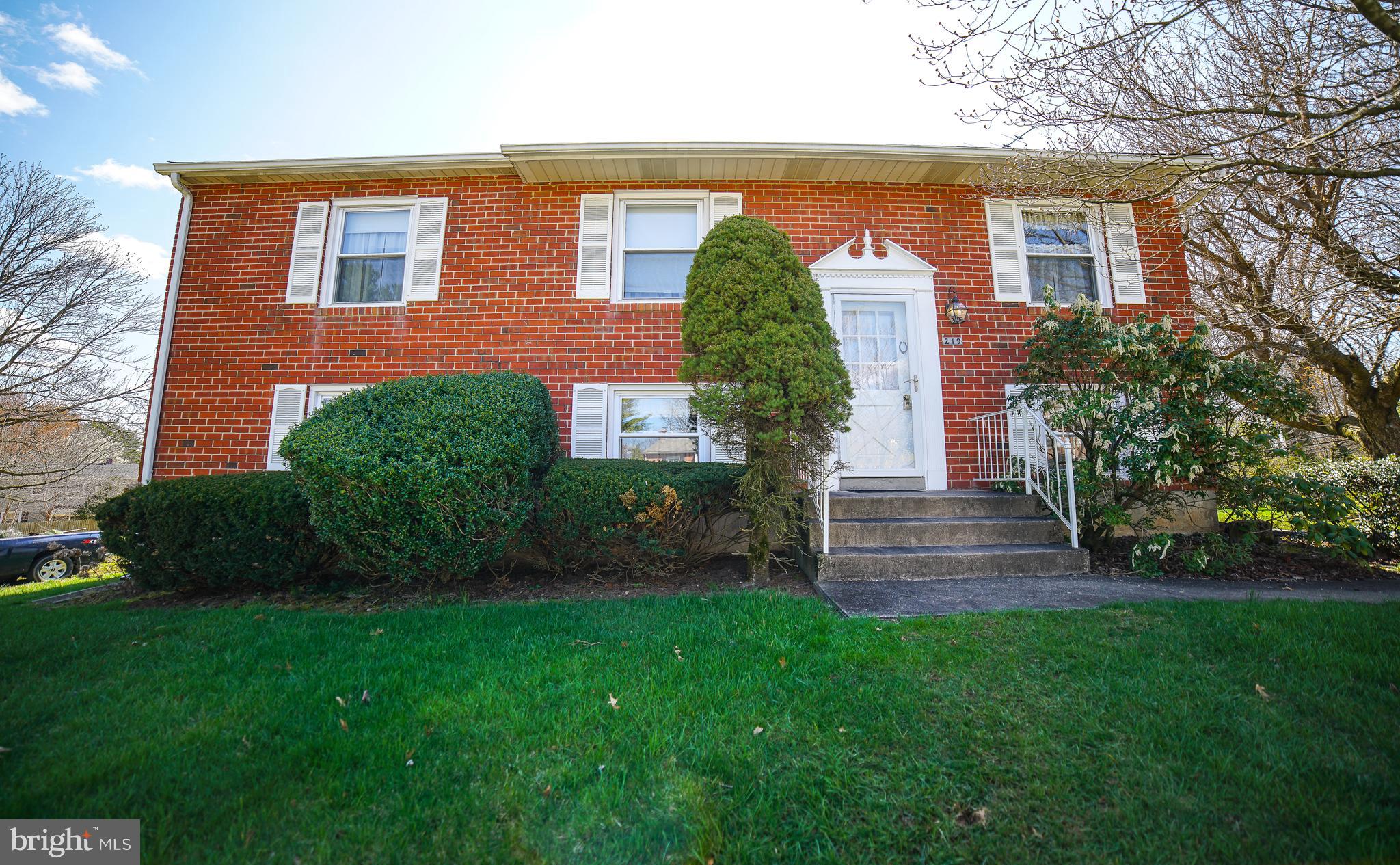219 Northway Road Reisterstown, MD 21136 - Photo 2 of 47 219 Northway Rd brick front and yard