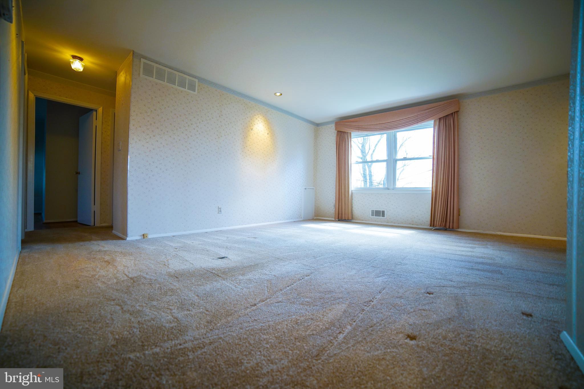219 Northway Road Reisterstown, MD 21136 - Photo 14 of 47 living room and hall to bedrooms