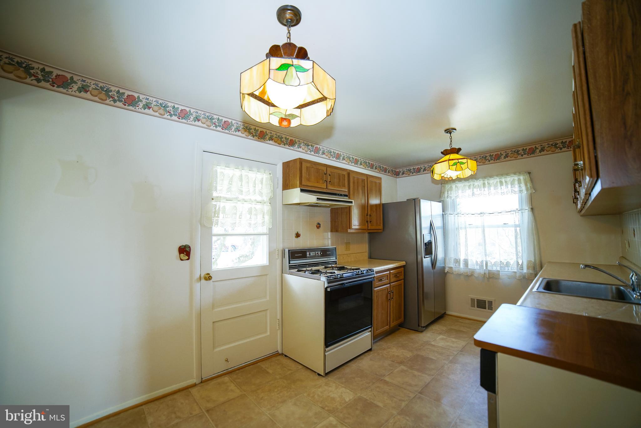 219 Northway Road Reisterstown, MD 21136 - Photo 20 of 47 kitchen with newer fridge