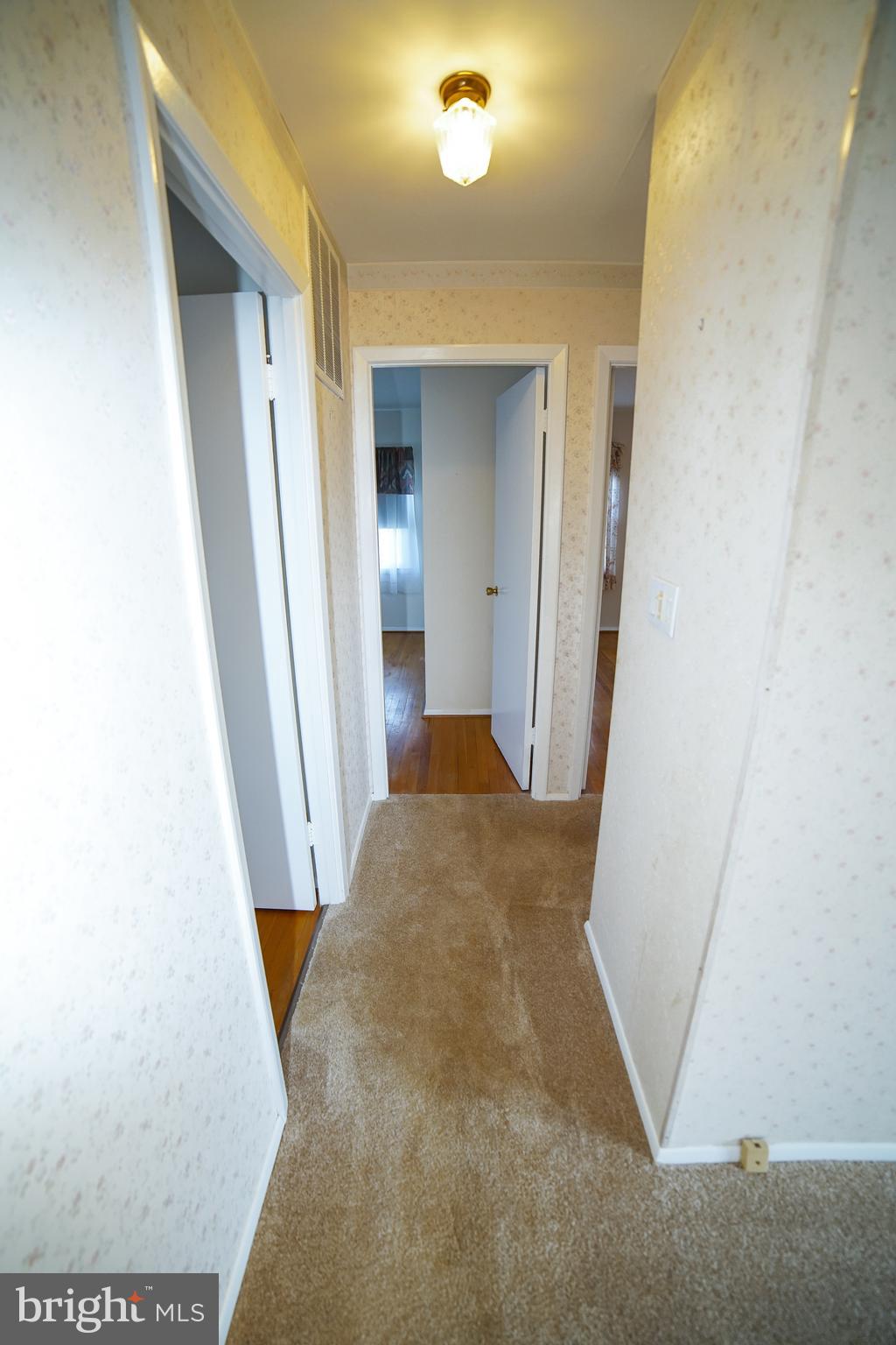 219 Northway Road Reisterstown, MD 21136 - Photo 23 of 47 hallway to 3 bedrooms and full bath