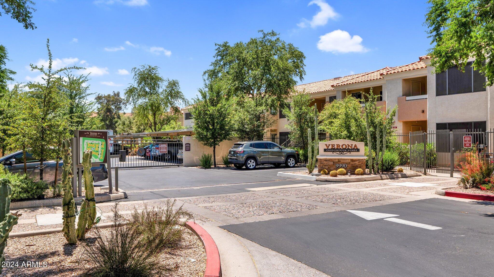 9990 North Scottsdale Road, Unit 1019 Paradise Valley, AZ 85253 - Photo 30 of 30 a view of street with parked cars