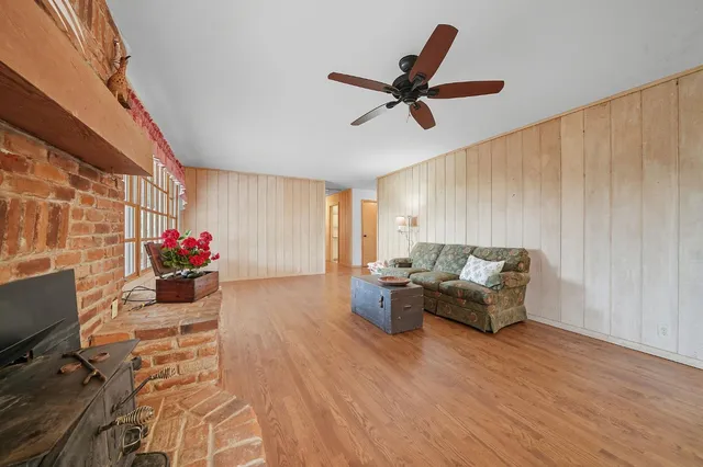 a bathroom with a sink vanity and mirror