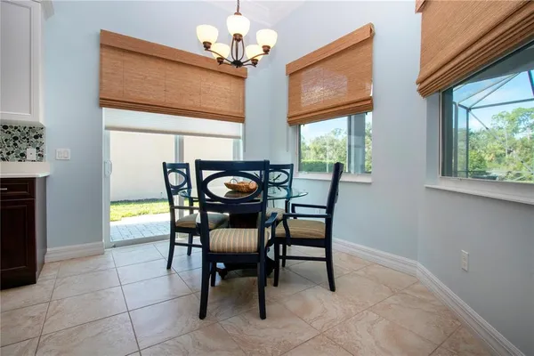a kitchen with a sink cabinets and appliances
