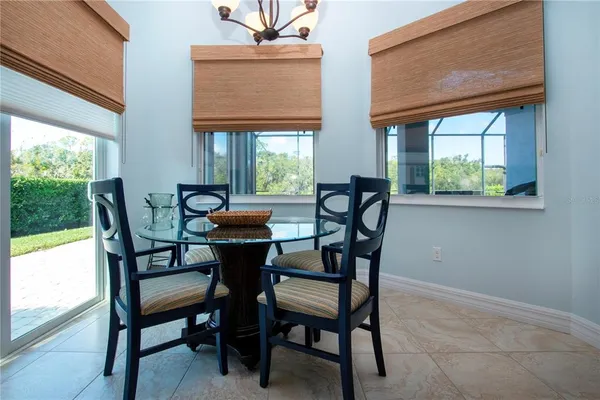 a kitchen with stainless steel appliances granite countertop a stove a sink dishwasher and a refrigerator