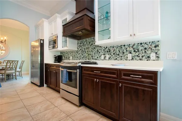 a kitchen with kitchen island granite countertop lots of counter top space