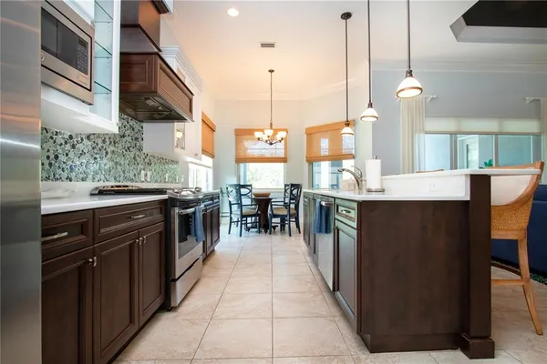 a bedroom with a bed chair and window
