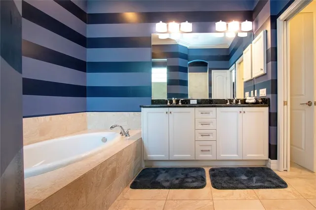 a view of swimming pool with outdoor seating