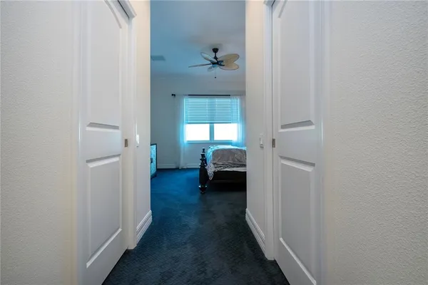 a view of a deck with wooden floor and outdoor seating