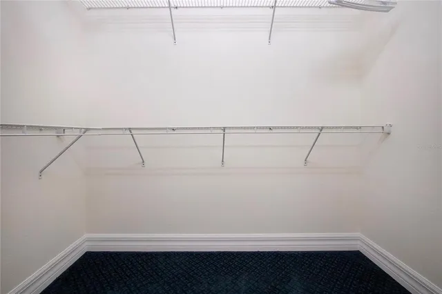 a view of a lake with a big yard