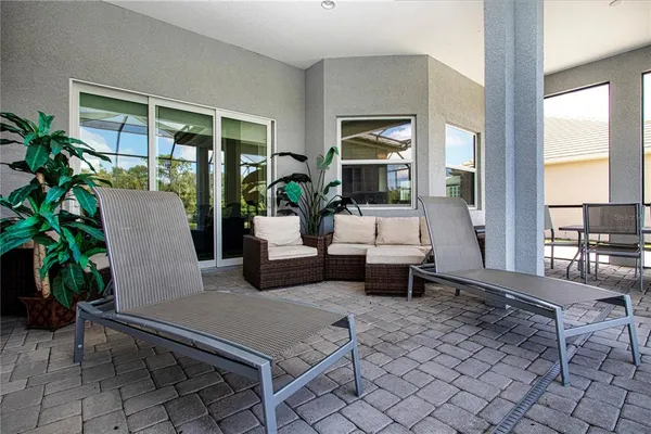 a view of sitting area with furniture and wooden floor