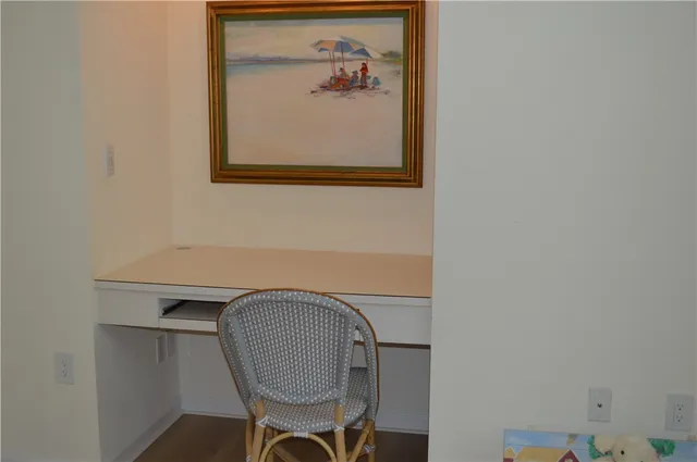 a room with a table and chairs