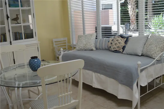 a living room with furniture and a table