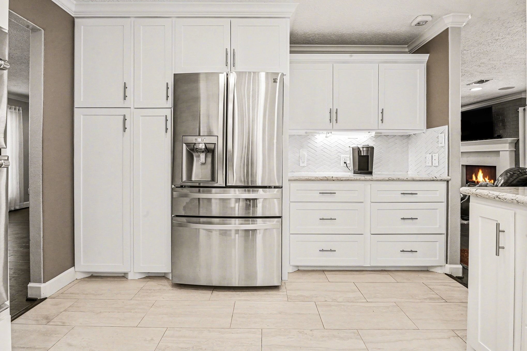 3409 Winter Lane Baytown, TX 77521 - Photo 11 of 44 a kitchen with appliances a refrigerator and cabinets