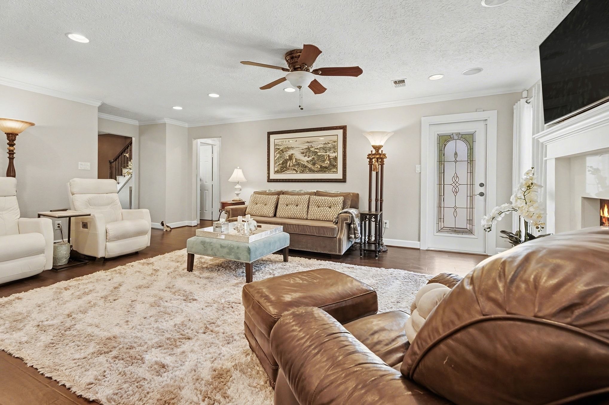 3409 Winter Lane Baytown, TX 77521 - Photo 13 of 44 a living room with furniture and a flat screen tv