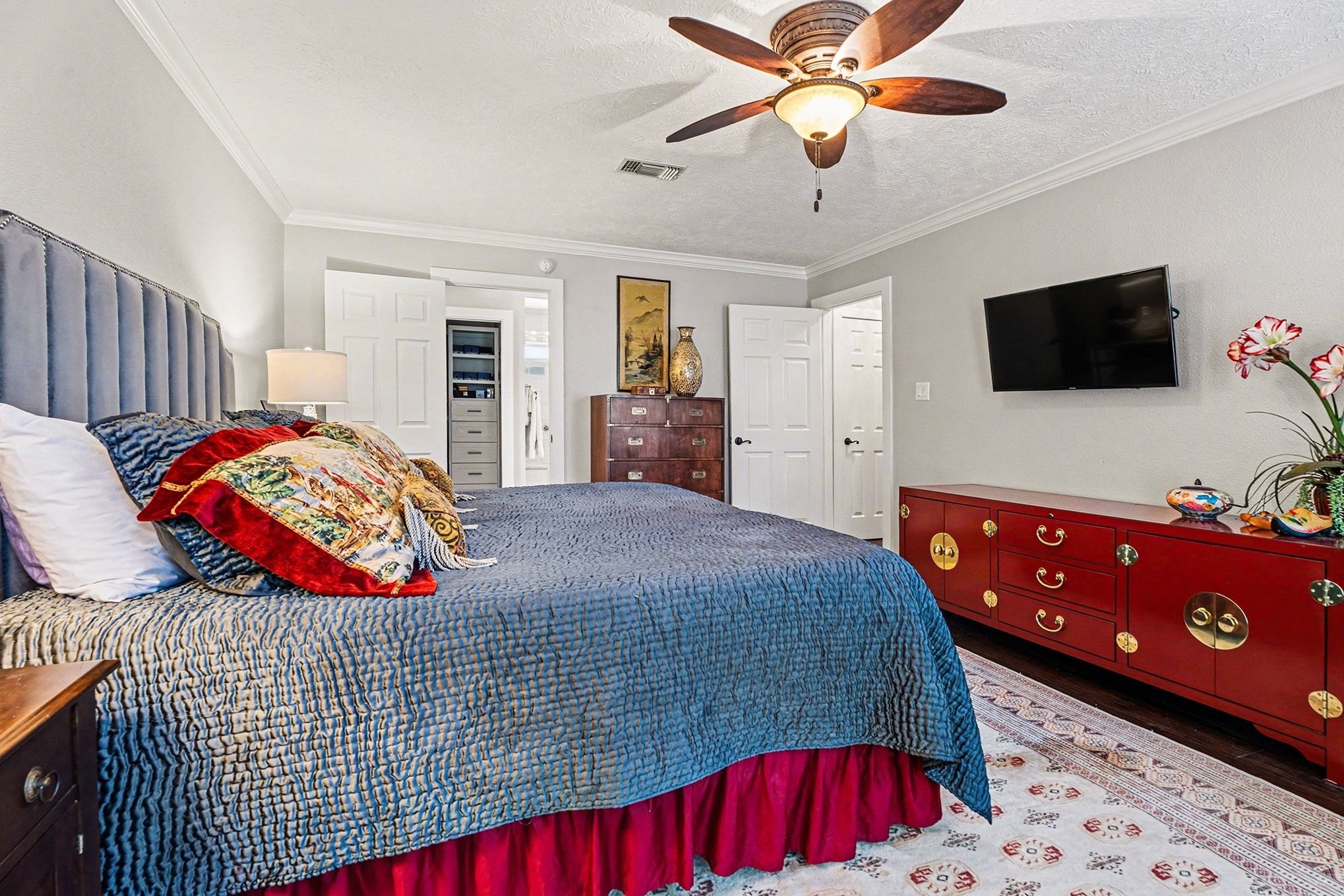 3409 Winter Lane Baytown, TX 77521 - Photo 16 of 44 a bedroom with a bed and a flat screen tv