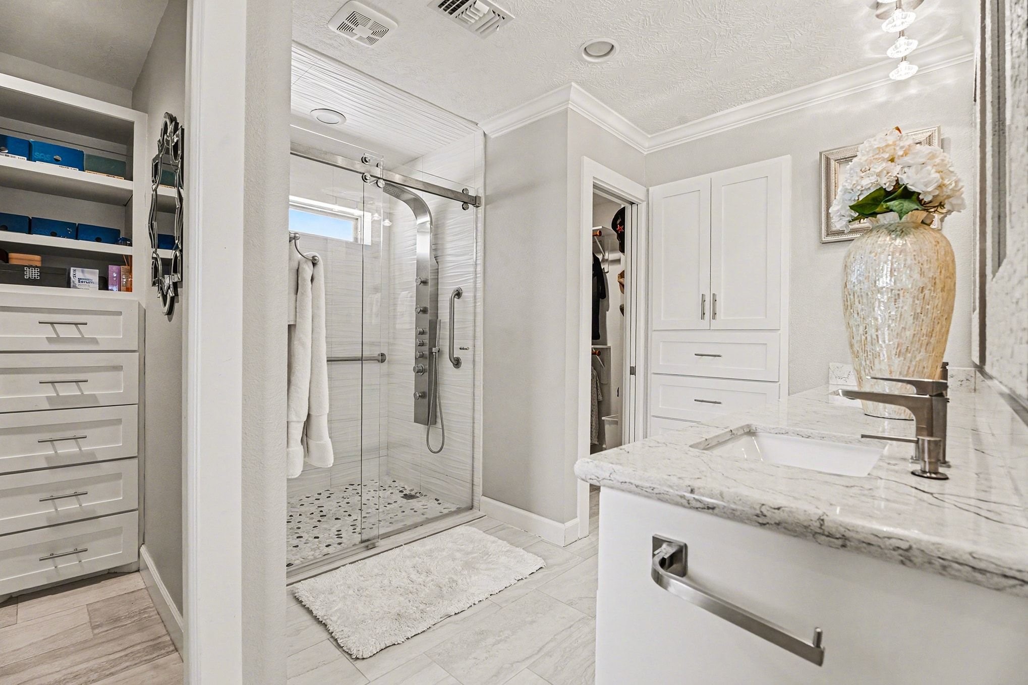 3409 Winter Lane Baytown, TX 77521 - Photo 17 of 44 a bathroom with a granite countertop sink mirror and shower