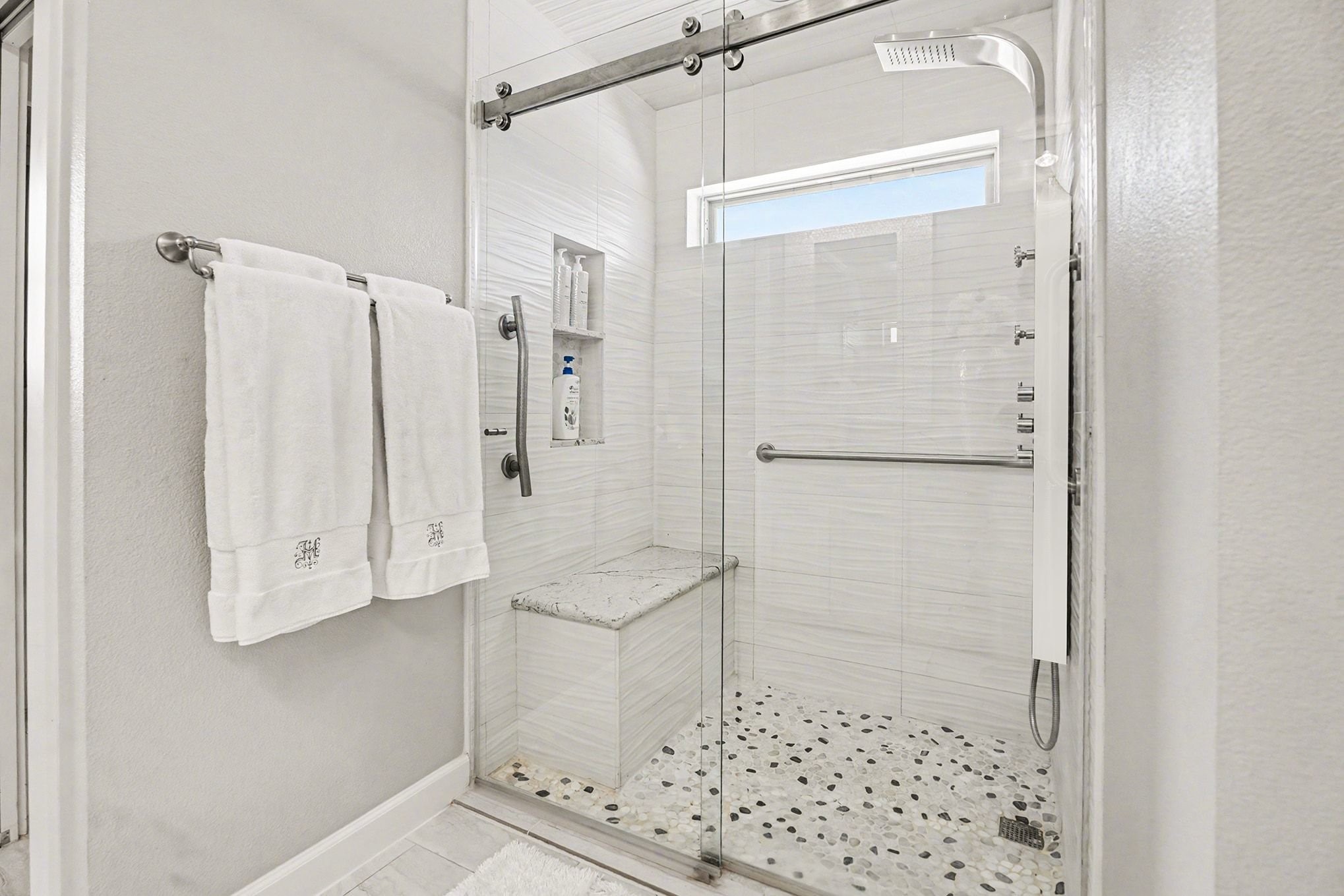 3409 Winter Lane Baytown, TX 77521 - Photo 20 of 44 a bathroom with a shower and a glass door