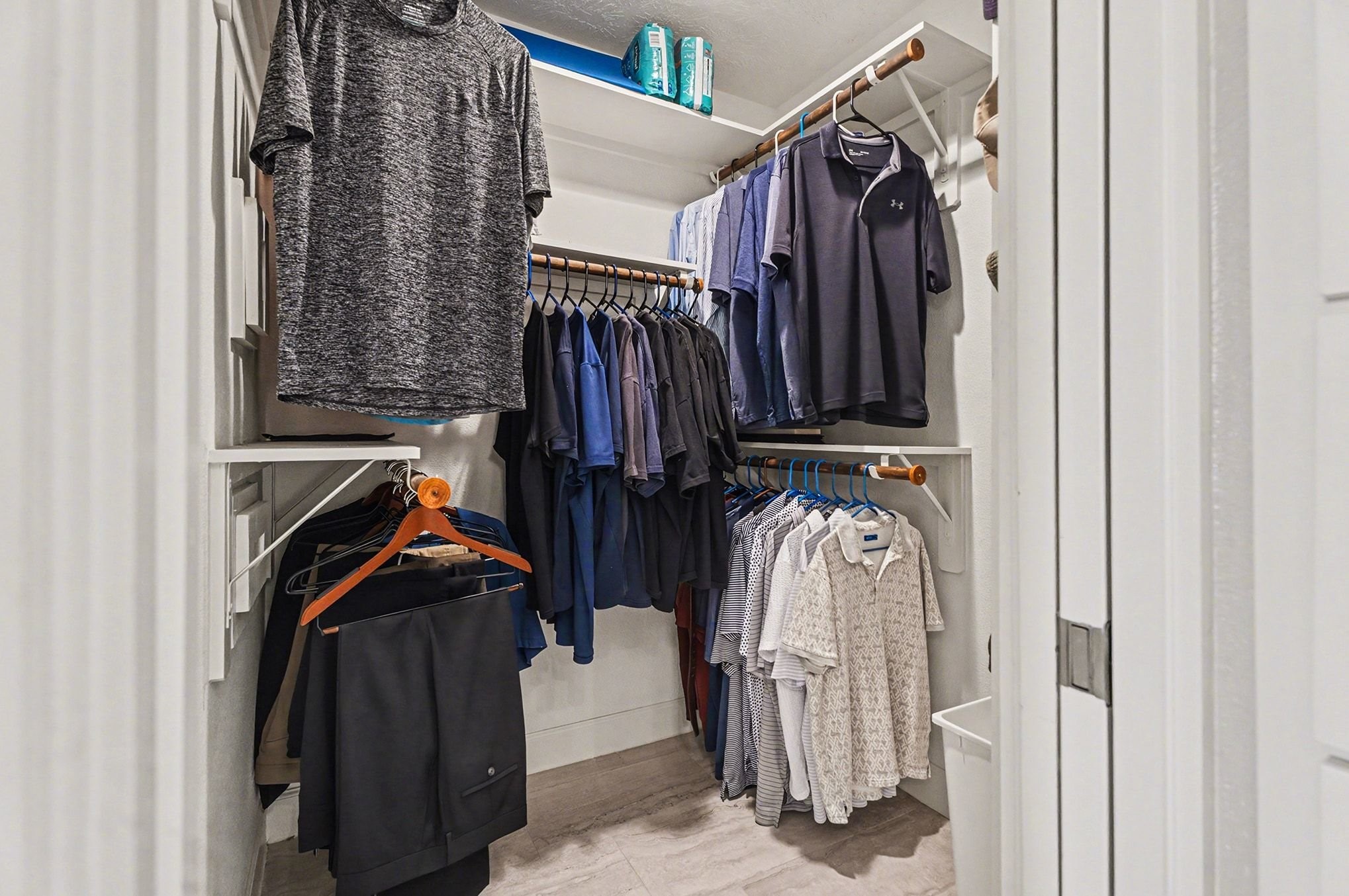 3409 Winter Lane Baytown, TX 77521 - Photo 21 of 44 a view of walk in closet with clothes and shoes