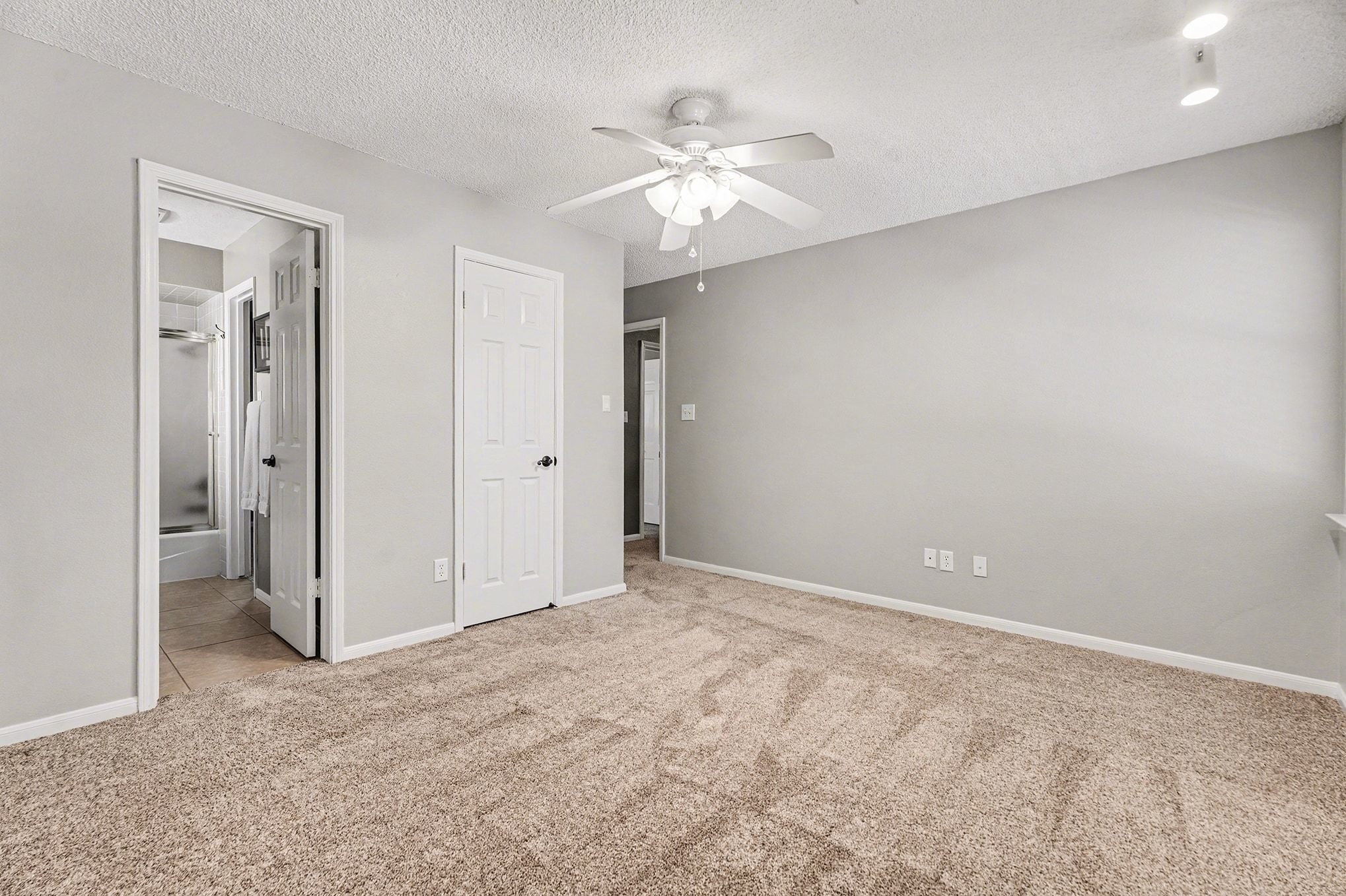 3409 Winter Lane Baytown, TX 77521 - Photo 23 of 44 a view of an empty room with a chandelier fan