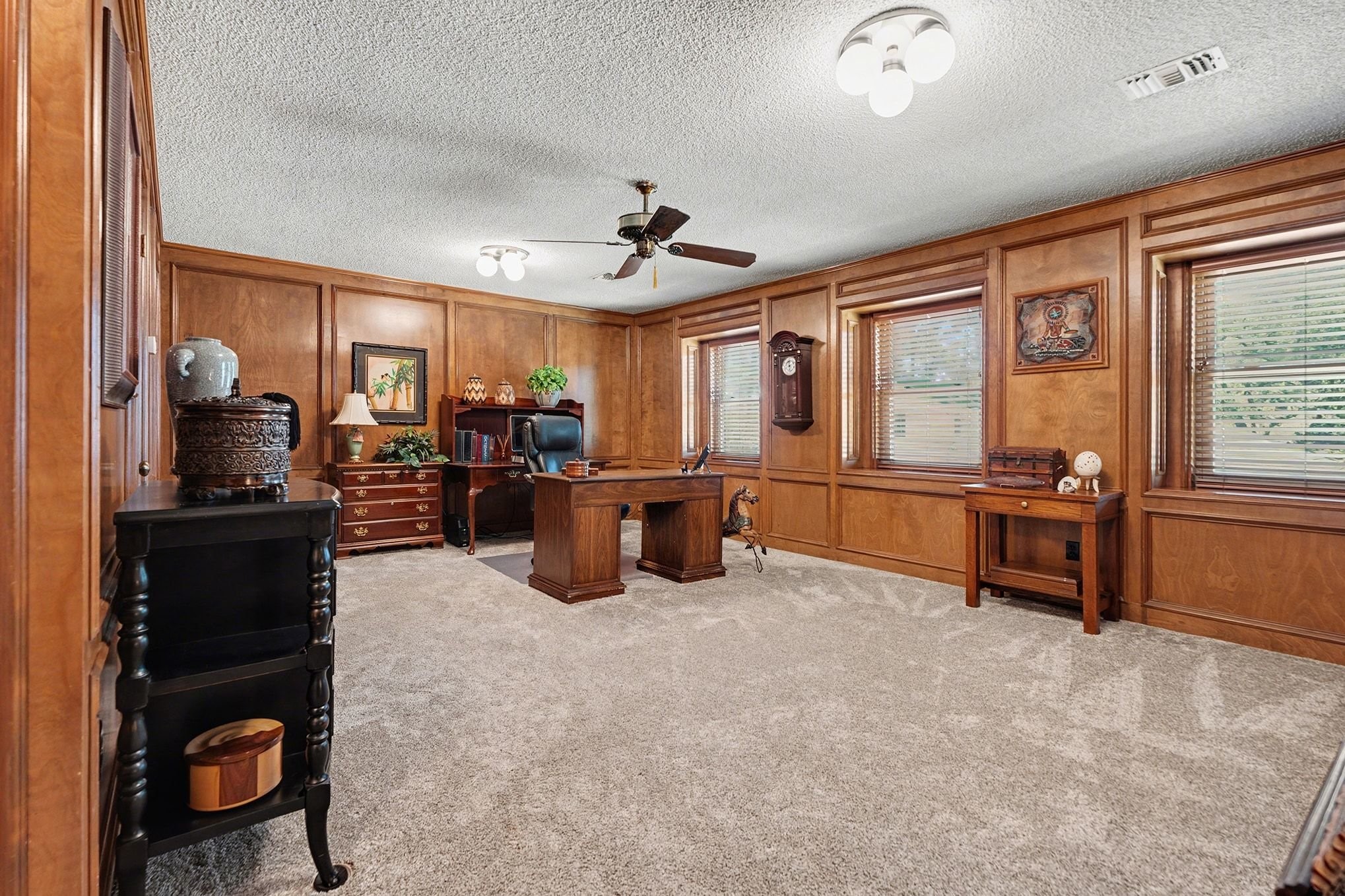 3409 Winter Lane Baytown, TX 77521 - Photo 28 of 44 a living room with furniture a large window with kitchen view