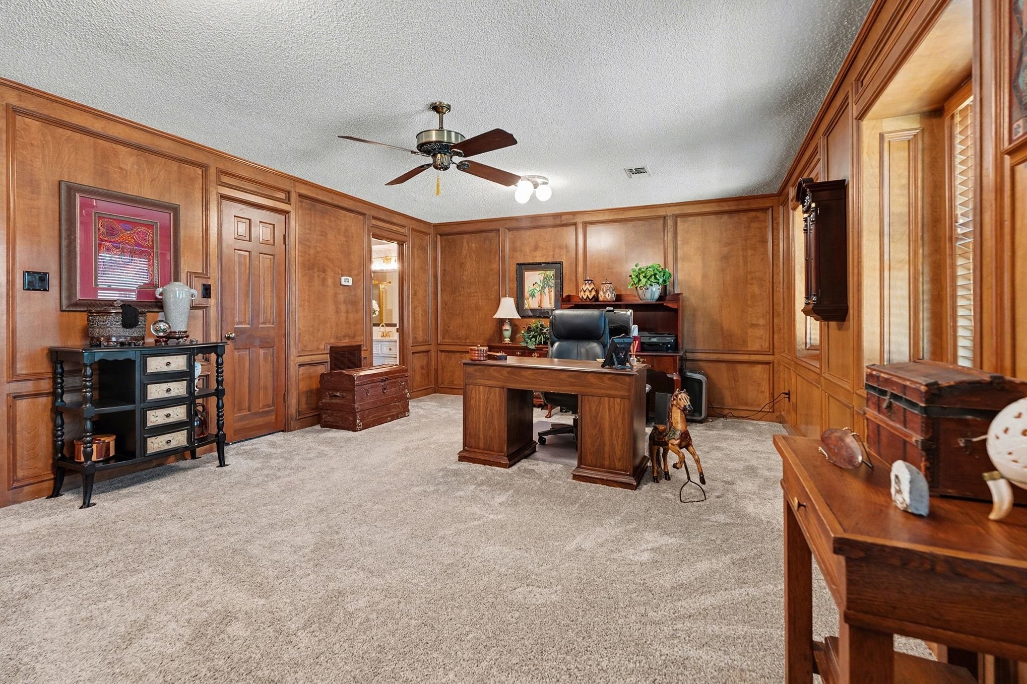 3409 Winter Lane Baytown, TX 77521 - Photo 29 of 44 a view of a workspace with furniture and a window