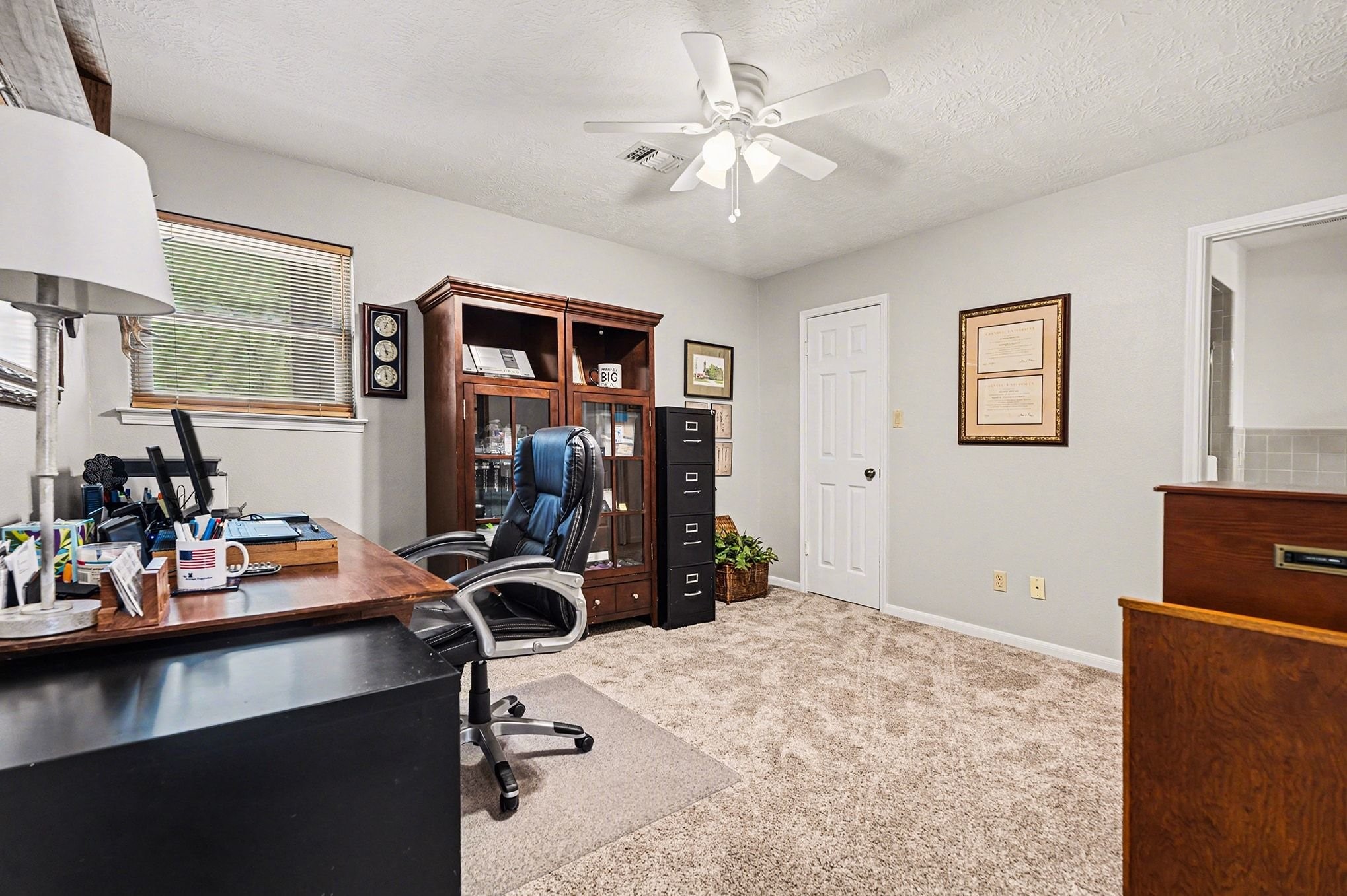 3409 Winter Lane Baytown, TX 77521 - Photo 31 of 44 a view of a workspace with furniture and gym equipment