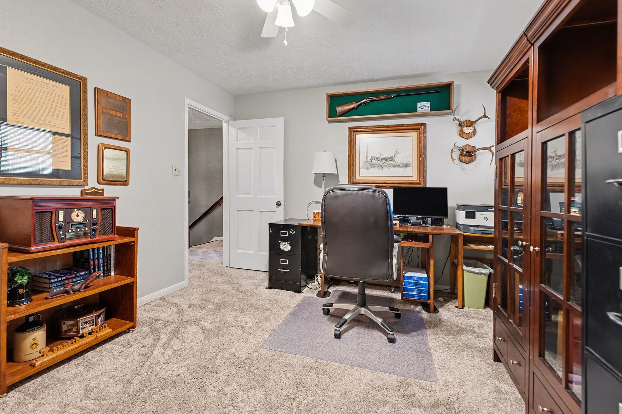 3409 Winter Lane Baytown, TX 77521 - Photo 32 of 44 a view of a workspace with furniture and a window