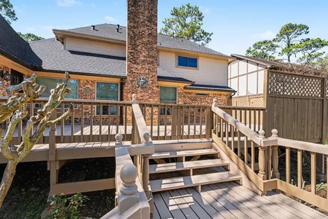 a view of a backyard with sitting area and slide
