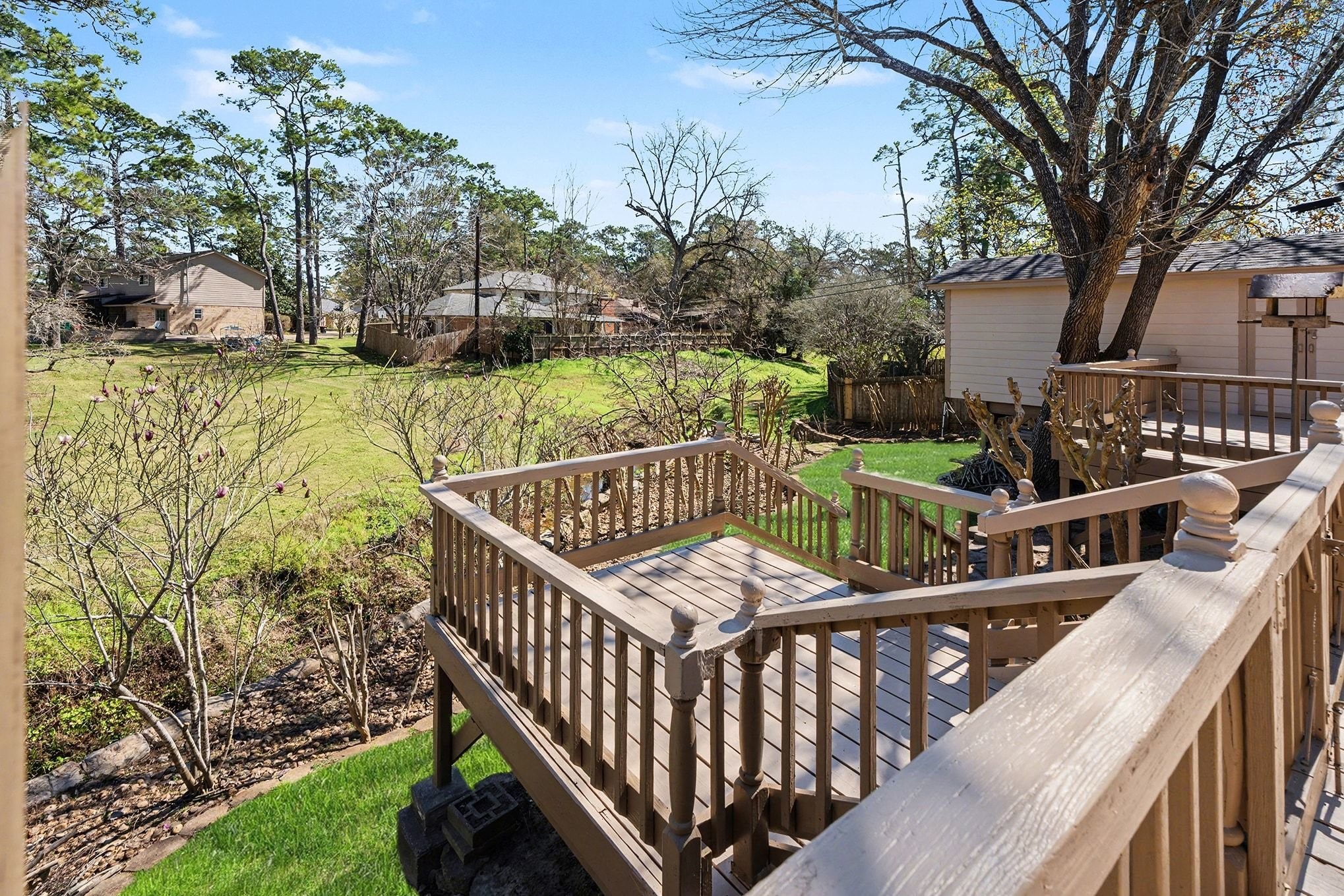 3409 Winter Lane Baytown, TX 77521 - Photo 42 of 44 a view of a roof deck with couches with wooden floor and fence