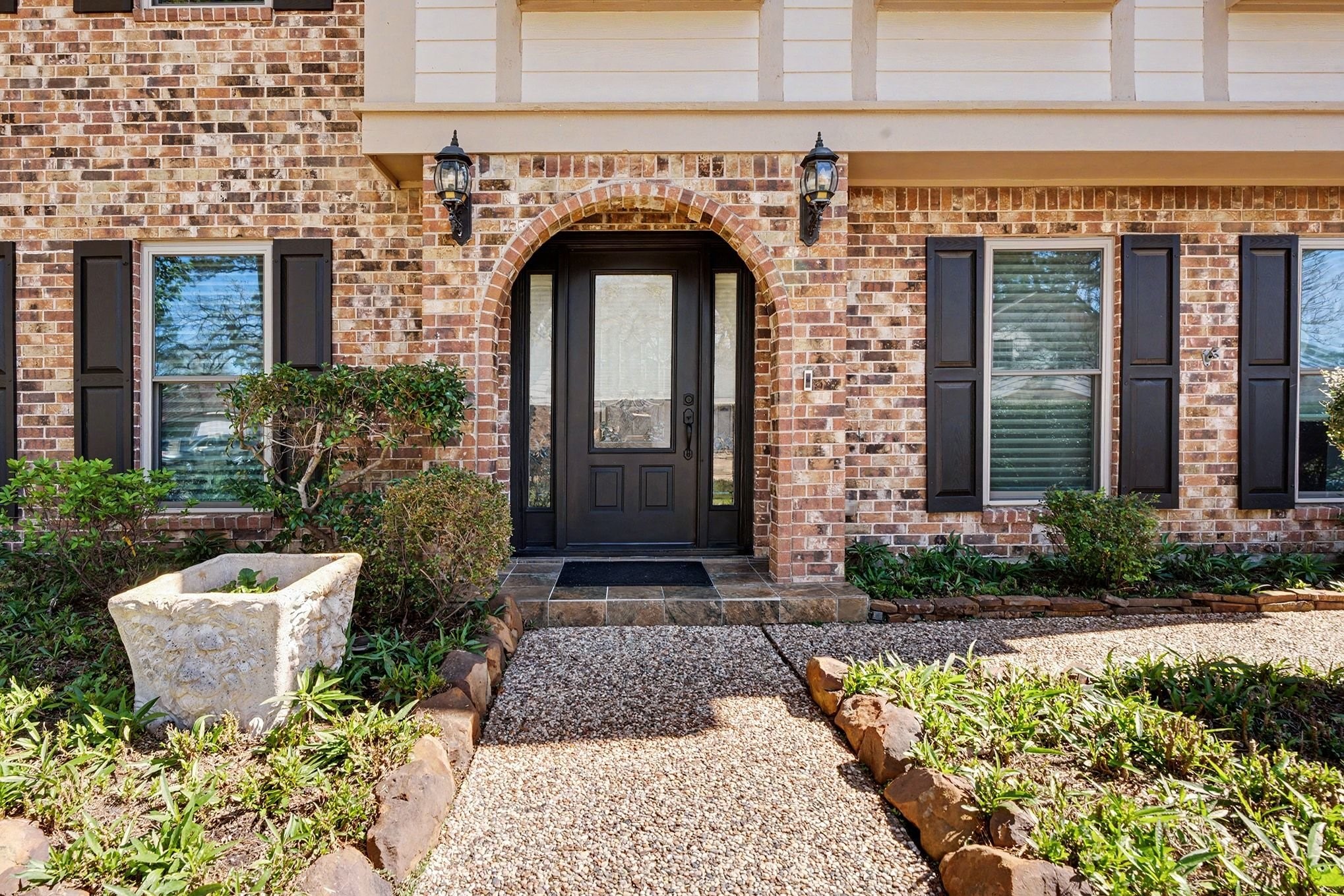 3409 Winter Lane Baytown, TX 77521 - Photo 5 of 44 a front view of a house with garden
