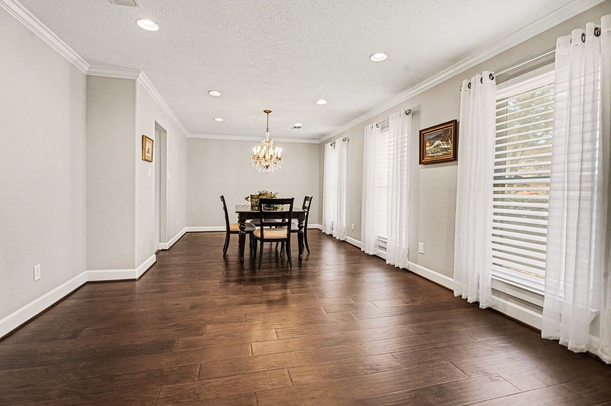 3409 Winter Lane Baytown, TX 77521 - Photo 7 of 44 a view of dining room with furniture and wooden floor