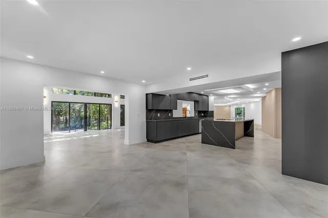 a view of staircase with a rug